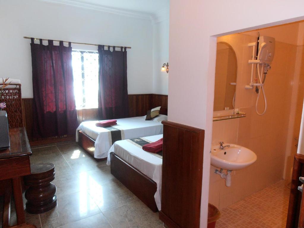 Firefly Guesthouse - The Berlin Angkor Сіємреап Номер фото