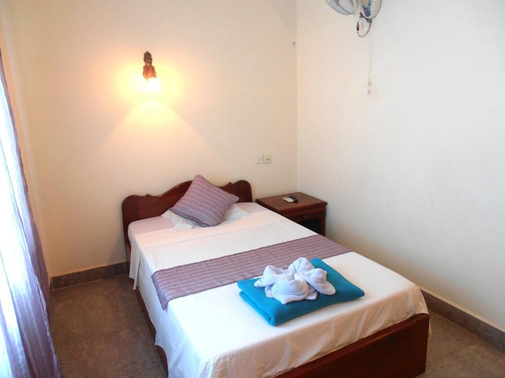 Firefly Guesthouse - The Berlin Angkor Сіємреап Номер фото