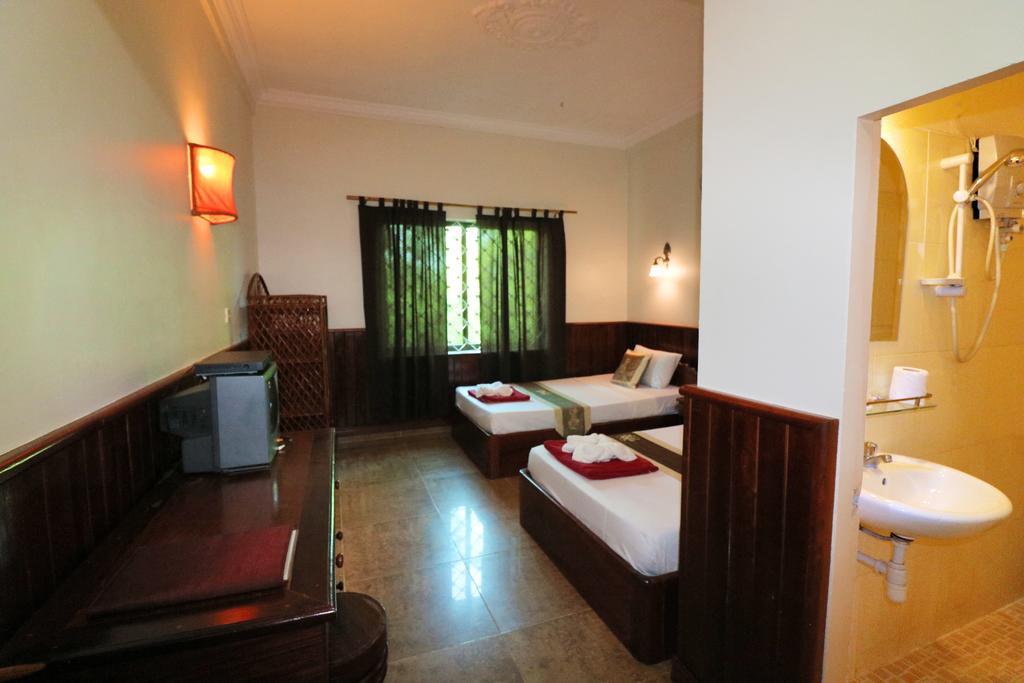Firefly Guesthouse - The Berlin Angkor Сіємреап Номер фото